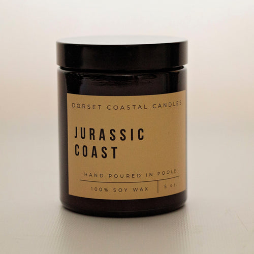 Dorset Coastal Candles Jurassic Coast is a luxurious resinous scent of many facets. A warm powdery indulgence - earthy smoky tonka bean with a slight hint of lavender and almond. A well balanced oriental with a velvety amber base. If you could describe a fragrance as a sensual enveloping hug, then this would be it! Top Notes - Lavender - Cinnamon. Middle Notes - Cypriol - Heliotrope - Myrrh - Guaiacwood. Base Notes - Moss - Amber - Vanilla - Tonka - Benzoin -Suede.